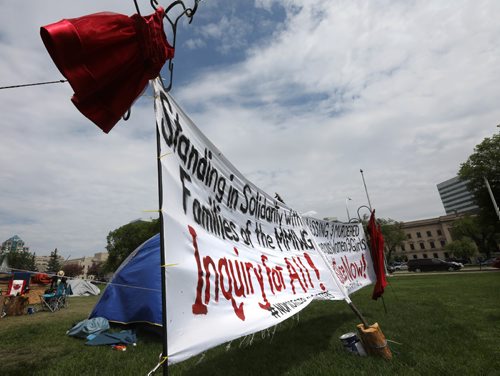 RUTH BONNEVILLE /  WINNIPEG FREE PRESS


A protest camp set up for Murdered and Missing Indigenous Women (MMIW) set up by Kim Kostiuk  with signs and red dresses at Memorial Park Thursday.
See Melissa Martin feature strory.  

May 24, 2017