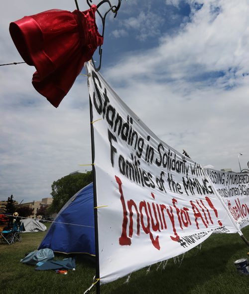 RUTH BONNEVILLE /  WINNIPEG FREE PRESS


A protest camp set up for Murdered and Missing Indigenous Women (MMIW) set up by Kim Kostiuk  with signs and red dresses at Memorial Park Thursday.
See Melissa Martin feature strory.  

May 24, 2017