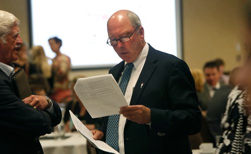 WAYNE GLOWACKI / WINNIPEG FREE PRESS

In centre, Colin Ferguson, president and CEO Travel Manitoba at the Tourism Town Hall at the Canad Inns-Polo Park Thursday. Martin Cash  story   May 25 2017