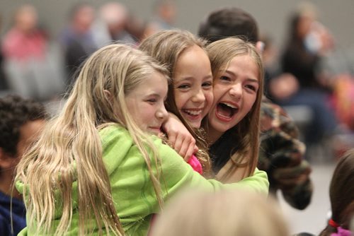 
RUTH BONNEVILLE /  WINNIPEG FREE PRESS

Ecole Lacerte school patrols from left Brooke Bjelland  (10yrs green), Evangeline Ambrose (9yrs, pink) and Nathalie Derocquigny  (10yrs in Bk)l can't hold back their excitement after hearing their school came in 1st in the City-Wide School Patrol teams  during 43rd Annual School Safety Patrol Awards at the Convention Centre Thursday.  
Standup photo 
May 24, 2017