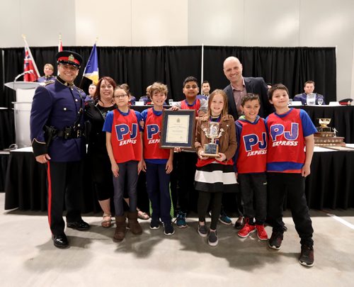 RUTH BONNEVILLE /  WINNIPEG FREE PRESS

Winnipeg Free Press editor, Paul Samyn, presents the Winnipeg Police Service Certificate of Recognition award along with constable Martin Boileau to school patrols representing Pacific Junction School during 43rd Annual School Safety Patrol Awards at the Convention Centre Thursday.  
 


May 24, 2017
