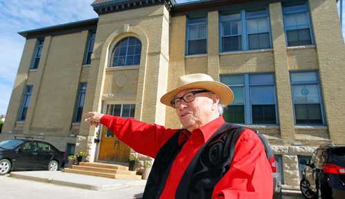 BORIS MINKEVICH / WINNIPEG FREE PRESS
Ted Fontaine was in the first class of the school when it opened in 1958. This is for a story about a reunion of the school survivors hes helping to plan. Photos taken at the Centre for Child Protection, which is the old residential school on Academy in Winnipeg. Here he poses outside the building. CAROL SANDERS STORY. May 26, 2017