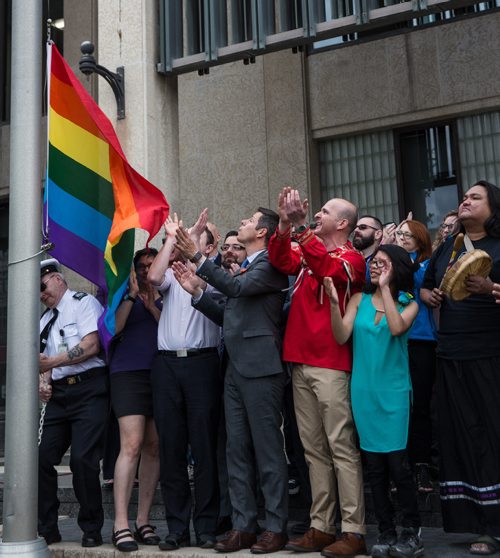 MIKE DEAL / WINNIPEG FREE PRESS
Mayor Brian Bowman and members of the LGBTTQ* community  during the annual rainbow flag-raising ceremony at City Hall to kick off Pride Week.
170526 - Friday, May 26, 2017.