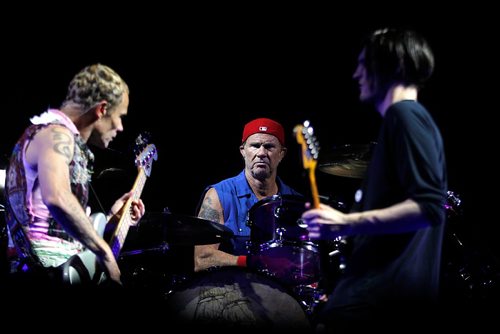 PHIL HOSSACK / WINNIPEG FREE PRESS  -   Red Hot Chili Pepper drummer Chad Smith flanked by bassist Flea (left) and guitar player Josh Klinghoffer at the MTS Centre Friday. See story..    -  May 26 2017