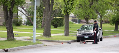 TREVOR HAGAN / WINNIPEG FREE PRESS
Jefferson Avenue between McPhillips Street and Fir Street is closed as Winnipeg Police investigate an MVC, Sunday, May 28, 2017.