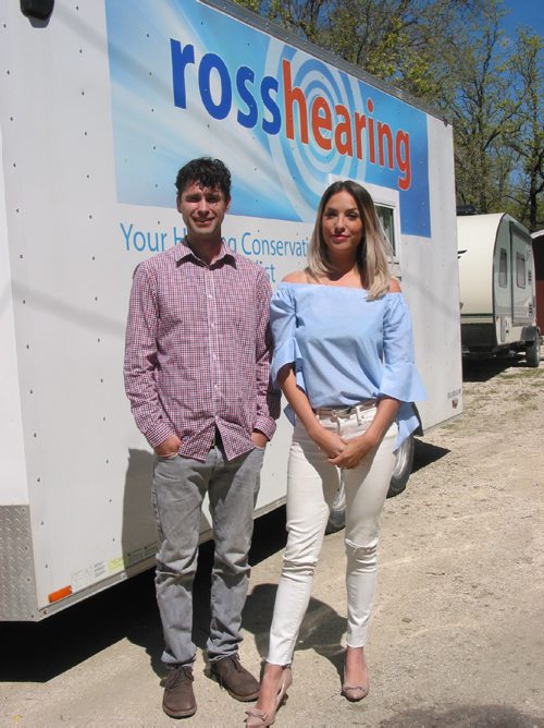 Canstar Community News May 23, 2017 - Mike and Leah Ross stand next to the trailer they use to test hearing and provide education as part of Ross Hearing. (ANDREA GEARY/CANSTAR COMMUNITY NEWS)