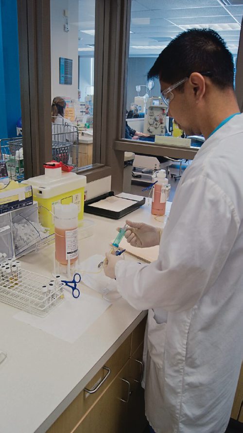 Canstar Community News May 23, 2017 -An employee at Prometic draws a sample of plasma to be sent away for health and safety testing. (DANIELLE DA SILVA/SOUWESTER/CANSTAR)