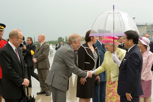 Dwight MacAulay, secretary, Order of Manitoba Advisory Council, and chief protocol officer for the province of Manitoba shakes hands with Queen Elizabeth during  the Royal Tour to Winnipeg in 2010.
100703 - Tuesday, May 30, 2010
