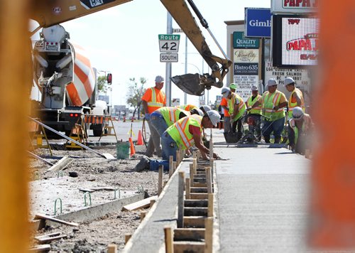 RUTH BONNEVILLE /  WINNIPEG FREE PRESS

Concrete crews work on new bike way in the curb lane heading south down Pembina Hwy near Weatherdon Wednesday.  

See story on bike lanes.  




May 31, 2017