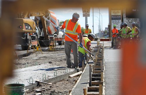 RUTH BONNEVILLE /  WINNIPEG FREE PRESS

Concrete crews work on new bike way in the curb lane heading south down Pembina Hwy near Weatherdon Wednesday.  

See story on bike lanes.  




May 31, 2017