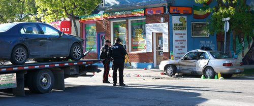 WAYNE GLOWACKI / WINNIPEG FREE PRESS

Winnipeg Police at the collision scene that closed Ellice Ave. at Toronto St. Wednesday morning. At least two vehicles were involved in the crash.    May 31 2017