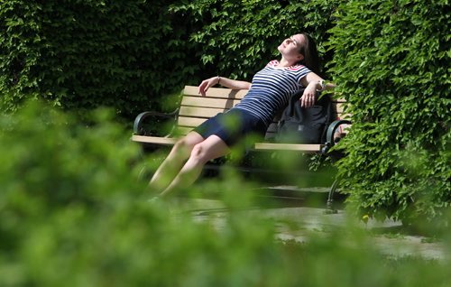 RUTH BONNEVILLE /  WINNIPEG FREE PRESS

Ilona Savarynyuk, a U of W Human Resources student, embraces the sunshine on a bench behind the Manitoba Legislative Building as temperatures spared to 29 degrees Thursday.

Weather standup.


June 01, 2017