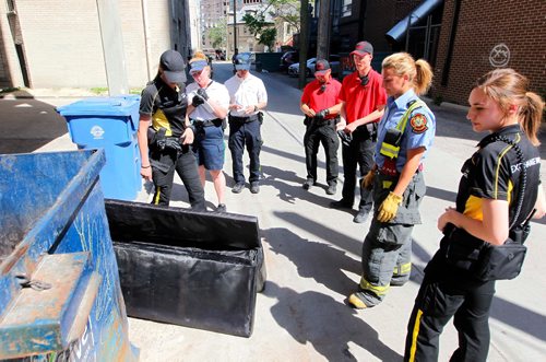BORIS MINKEVICH / WINNIPEG FREE PRESS
Winnipeg Fire Paramedic Service partners with local BIZ groups to help reduce the risk of arson this summer. Here the groups discover an arson hazard, a abandoned couch, in the back lane in the 400 block of Kennedy Street. Ashley Prest  story. June 2, 2017
