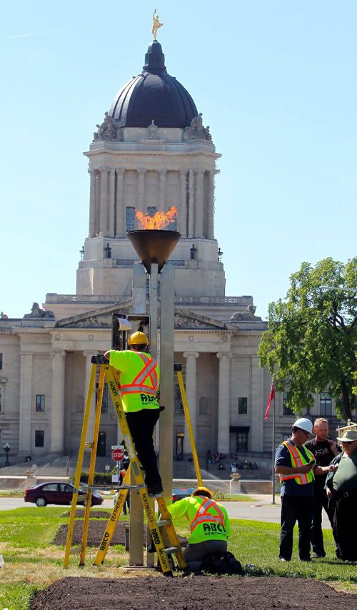 BORIS MINKEVICH / WINNIPEG FREE PRESS
The 2017 Canada Games flame gets installed and tested today near the Manitoba Legislature on Memorial Blvd. The unit was restored to work and a new gas line installed. This 12-foot, free-standing structure on Memorial Boulevard in Winnipeg, also known the Centennial Flame or the fire of friendship, was erected in 1967 in commemoration of the Canadian Centenary. from: http://www.mhs.mb.ca/docs/sites/centennialtorch.shtml  STANDUP June 2, 2017
