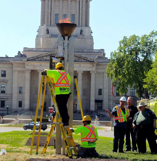 BORIS MINKEVICH / WINNIPEG FREE PRESS
The 2017 Canada Games flame gets installed and tested today near the Manitoba Legislature on Memorial Blvd. The unit was restored to work and a new gas line installed. This 12-foot, free-standing structure on Memorial Boulevard in Winnipeg, also known the Centennial Flame or the fire of friendship, was erected in 1967 in commemoration of the Canadian Centenary. from: http://www.mhs.mb.ca/docs/sites/centennialtorch.shtml  STANDUP June 2, 2017
