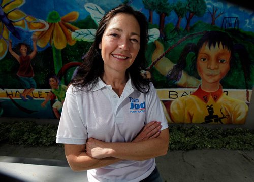 PHIL HOSSACK / WINNIPEG FREE PRESS  -  Jodi Moskal, Conservative candidate in Point Douglas poses beside a mural at Norquay School Friday. See story.  -  June 2, 2017