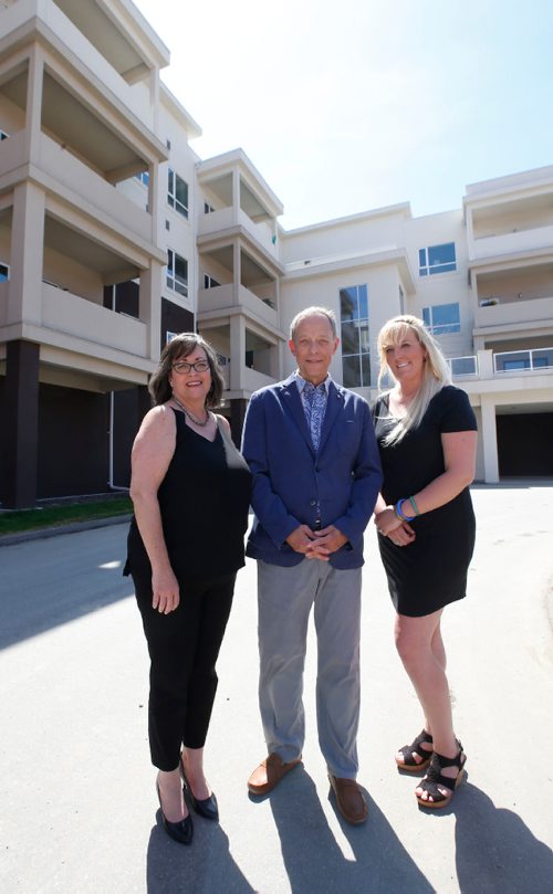 WAYNE GLOWACKI / WINNIPEG FREE PRESS

From left, Trish Boggs, Director, Residential Div., Stevenson Management Services Ltd., Allan Borodkin, president of Dynasty Lands International Inc. and Nina McCall, Property Manager with Stevenson Management Services Ltd., in front of Phase I of the Silver Heights Condominiums at 350 Lodge Ave. Murray McNeill real estate column. June 2 2017