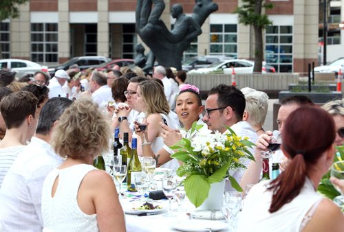 JASON HALSTEAD / WINNIPEG FREE PRESS

Diners sit near Portage and Main at the Table for 1200 More on Rorie Street in the east Exchange and around the Richardson Building on June 3, 2017. (See Social Page)