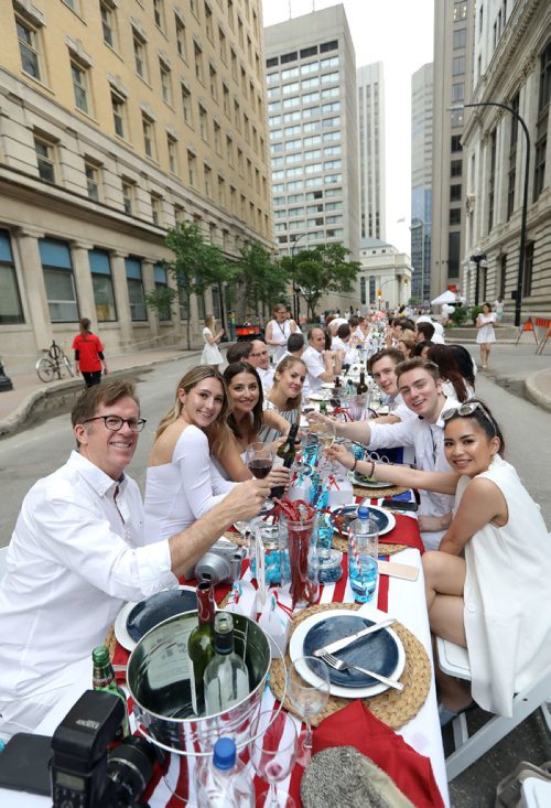 JASON HALSTEAD / WINNIPEG FREE PRESS

Guests at the Wilson Diagnostic Imaging Med Corp table at the Table for 1200 More on Rorie Street in the east Exchange and around the Richardson Building on June 3, 2017. (See Social Page)