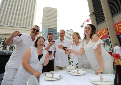 JASON HALSTEAD / WINNIPEG FREE PRESS

L-R: Mike Jack, Mary Beth Taylor, Scott McFadyen, Andrew Enns, Lori Mitchell and Amy McGuinness at the Table for 1200 More on Rorie Street in the east Exchange and around the Richardson Building on June 3, 2017. (See Social Page)