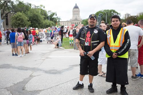 JEN DOERKSEN/WINNIPEG FREE PRESS
Members of Bear Clan Patrol helped to monitor the 30th annual Pride Parade by helping keep peope out of traffic and maintain boundaries between the march and vehicle traffic. Sunday, June 4, 2017.