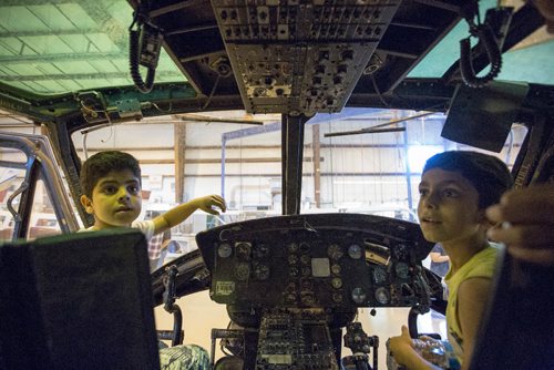 JUSTIN SAMANSKI-LANGILLE / WINNIPEG FREE PRESS
Students explore the cockpit of one of Red River College's aircraft following a lesson on coding. Students from Pinkham Elementary School participated in the event as a part of Canada Learning Code Week.
170605 - Monday, June 05, 2017.