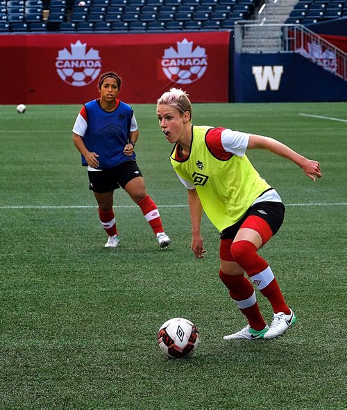PHIL HOSSACK / WINNIPEG FREE PRESS  -  With Desiree Scott backing her up Team Canada's Sophie Schmidt lines up a kick in scrimmage practice at Investors Group Field Wednesday. See Jason Bell's story.  -  June 7, 2017