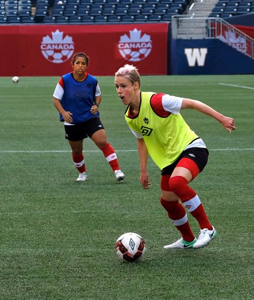 PHIL HOSSACK / WINNIPEG FREE PRESS  -   Team Canada's Sophie Schmidt on the pitch in scrimmage practice at Investors Group Field Wednesday. Deiree Scott behind her. See Jason Bell's story.  -  June 7, 2017