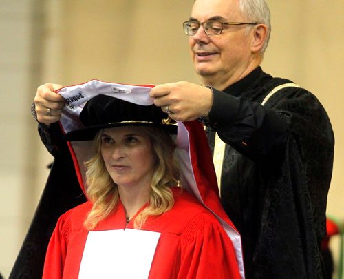 BORIS MINKEVICH / WINNIPEG FREE PRESS
University of Manitoba's 138th Annual Convocation at Investors Group Athletic Centre (IGAC), Fort Garry Campus. Honorary Doctor of Laws givin to U of M Grad and curling champion Jennifer Jones, left. Right is President and Vice-Chancellor of the University of Manitoba Dr. David Barnard. June 8, 2017
