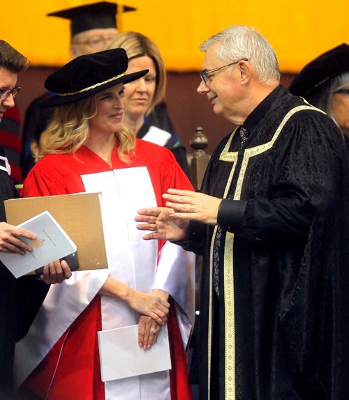 BORIS MINKEVICH / WINNIPEG FREE PRESS
University of Manitoba's 138th Annual Convocation at Investors Group Athletic Centre (IGAC), Fort Garry Campus. Honorary Doctor of Laws givin to U of M Grad and curling champion Jennifer Jones, left. Right is  President and Vice-Chancellor of the University of Manitoba Dr. David Barnard. June 8, 2017
