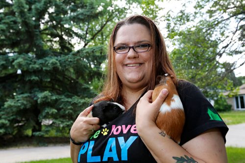 JUSTIN SAMANSKI-LANGILLE / WINNIPEG FREE PRESS
Cindy Hildebrand poses outside her home with a pair of rescued guinea pigs. On Friday, Cindy and her partner Jeff will be officially opening Popcorn and Binkies Rescue Haven for rabbits and guinea pigs.
170608 - Thursday, June 08, 2017.