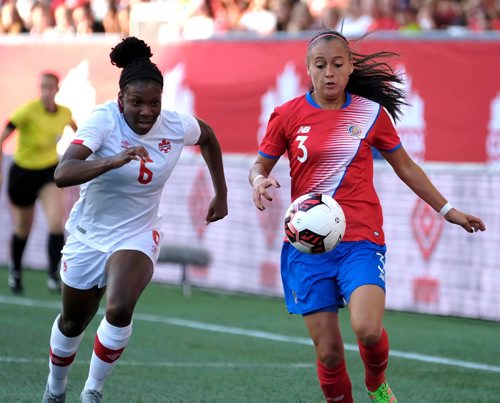 PHIL HOSSACK / WINNIPEG FREE PRESS  -   Team Canada's #6 Deanne Rose closes in on Costa Rica's #3 Maria Jose Morale Thursday night at Investor's Group Field. See story.  -  June 8 2017