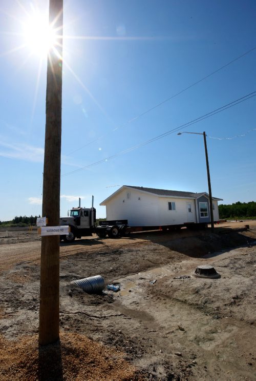 WAYNE GLOWACKI / WINNIPEG FREE PRESS

A new home on a trailer ready to be placed on a lot in the Lake St. Martin First Nation housing development under construction.  Bill Redekop story. June 9  2017