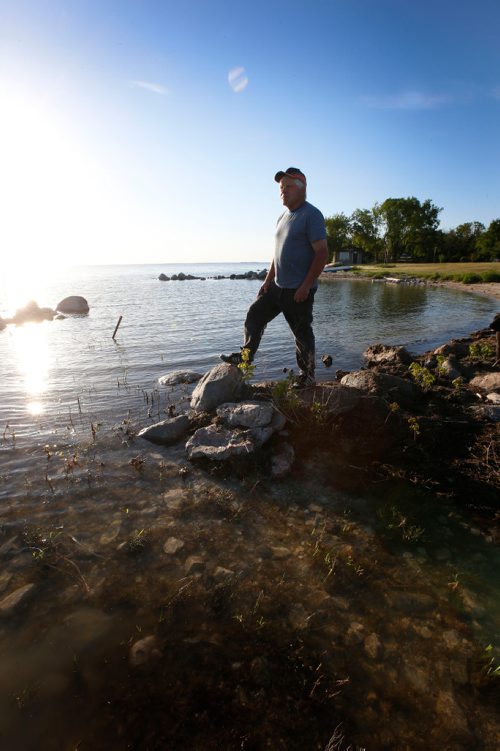 WAYNE GLOWACKI / WINNIPEG FREE PRESS

Dave Olson lives in Peonan Point, a peninsula in the northern part of Lake Manitoba. He is standing along the lake by the family home.    Bill Redekop story. June 9  2017