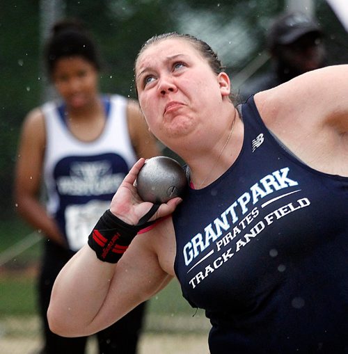PHIL HOSSACK / WINNIPEG FREE PRESS  -  Taylor Heald didn't let the rain stop her Friday. The Grant Park Pirate tied the record in shot put with water dripping off her brow. See story.   -  June 9, 2017