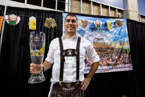 JUSTIN SAMANSKI-LANGILLE / WINNIPEG FREE PRESS
Andreas Runesson of Simplicity Wines poses in mock lederhosen and with a giant beer stein to promote Paulaner, a beer from Germany. Over 250 beers and ciders from around the world are available at this years Flatlander's Beer Festival.
170610 - Saturday, June 10, 2017.