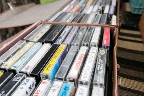 JUSTIN SAMANSKI-LANGILLE / WINNIPEG FREE PRESS
A collection of cassettes sits in boxes at a garage sale Friday. There are garage sales popping up around the city all the time and you never know what treasures you might find.
170609 - Friday, June 09, 2017.