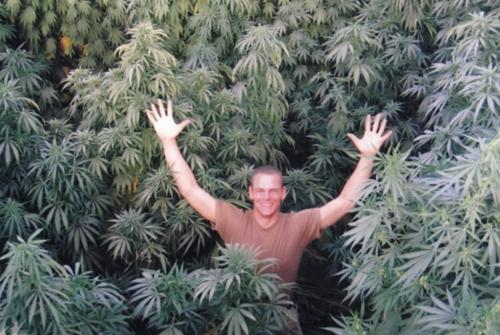 Cpl. James Arnal in marijuana field on his first tour in afghanistan. family photo winnipeg free press