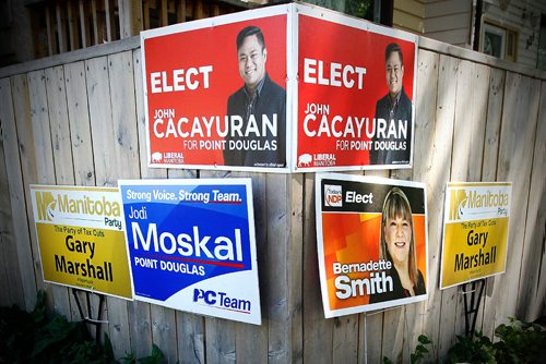 JOHN WOODS / WINNIPEG FREE PRESS
Some candidate signs on Austin Street in Point Douglas prior to Tuesday's by-election Monday, June 12, 2017.
