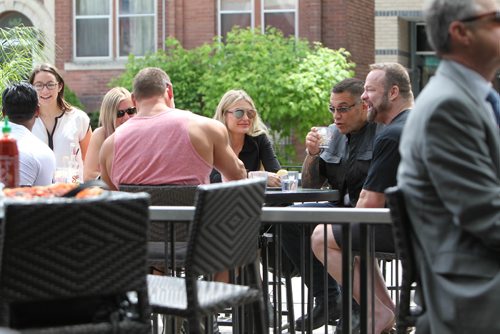 RUTH BONNEVILLE / WINNIPEG FREE PRESS

People sit on the patio at Teo's restaurant on Corydon  Monday.  

June 12, 2017