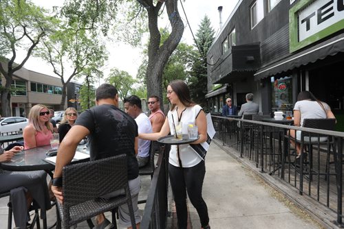 RUTH BONNEVILLE / WINNIPEG FREE PRESS

People sit on the patio at Teo's restaurant on Corydon  Monday.  

June 12, 2017