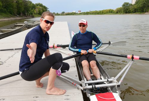 WAYNE GLOWACKI / WINNIPEG FREE PRESS

Free Press Sports editor Steve Lyons gets an introduction to rowing from Olympian Janine Stephens at the Winnipeg Rowing Club.    Steve Lyons column. June 13   2017