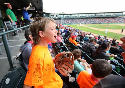 
RUTH BONNEVILLE / WINNIPEG FREE PRESS

Matthew Toews a grade 4 student from Tanners Crossing School in Minnedosa cheers on the Winnipeg Goldeyes with his classmates  during afternoon game at Shaw Park Tuesday.  The stands were full of students from all over the city and province many of which had never been to a game before.  

June 13, 2017