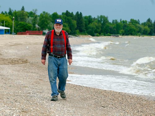 BORIS MINKEVICH / WINNIPEG FREE PRESS
Commercial fishermen Robert Kristjanson in Gimli. He's been commercial fishing in Gimli since he was 14 and he's now 83. His family has been in the commercial fishing business since the 1800's. He thinks the Zebra mussels are gonna eventually spell doomsday for the lake. Here he walks down the beach in Gimli. June 12, 2017
