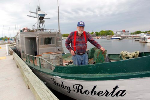 BORIS MINKEVICH / WINNIPEG FREE PRESS
Commercial fishermen Robert Kristjanson in Gimli. He's been commercial fishing in Gimli since he was 14 and he's now 83. His family has been in the commercial fishing business since the 1800's. He thinks the Zebra mussels are gonna eventually spell doomsday for the lake. Here he poses on his fishing boat docked at Gimli Harbour. June 12, 2017
