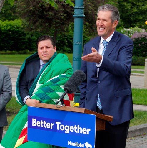 BORIS MINKEVICH / WINNIPEG FREE PRESS
Premier Brian Pallister's Peguis Bike Trip tour kickoff at South plaza, Legislative Building grounds. From left, Grand Chief Jerry Daniels with a star blanket given to him by Premier Brian Pallister. NICK MARTIN STORY. June 15, 2017
