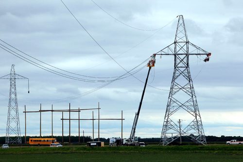 BORIS MINKEVICH / WINNIPEG FREE PRESS
Power lines for Manitoba Hydro Bipole III (3) get installed near the transcanada Highway #1 and #12 Highway, near Dufresne, Manitoba. June 15, 2017
