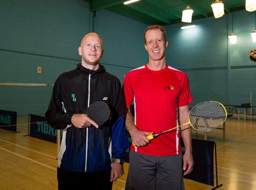 JUSTIN SAMANSKI-LANGILLE / WINNIPEG FREE PRESS
Rackleton players Kresten Hougaard (L) and Evan Mancer (R) pose on the badminton court at the Winnipeg Winter Club. In each Rackleton match, players compete against each other in short rounds of tennis, badminton, squash and table tennis. 
170616 - Friday, June 16, 2017.