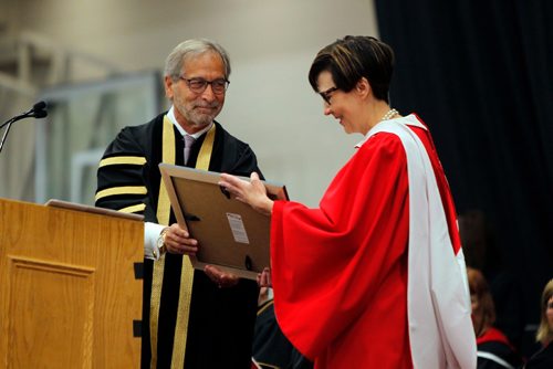 BORIS MINKEVICH / WINNIPEG FREE PRESS
U of W Convocation at Duckworth Centre. U of W Chancellor Robert Silver aids in giving Cindy Blackstock received an honorary doctor of Laws. June 16, 2017
