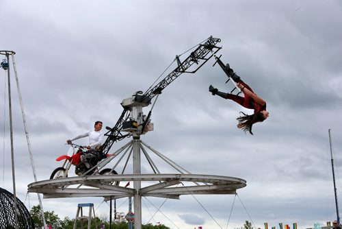 WAYNE GLOWACKI / WINNIPEG FREE PRESS

Moto Maniacs Ivan Espana drives his wife Allison Blei in circles during their performance on the opening day at The Ex at Red River Exhibition Park. Stefanie Lasuik story      June 16   2017